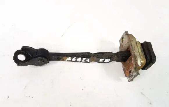 Front door check strap stopper