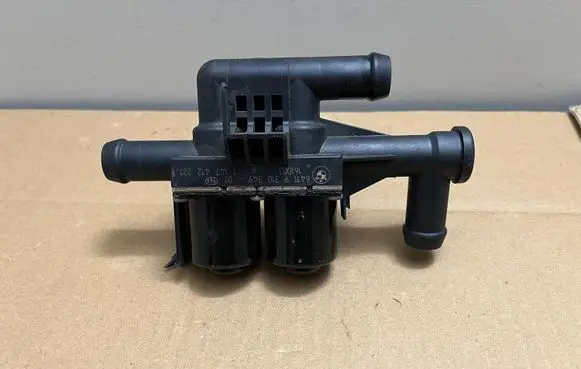 Coolant heater control valve
