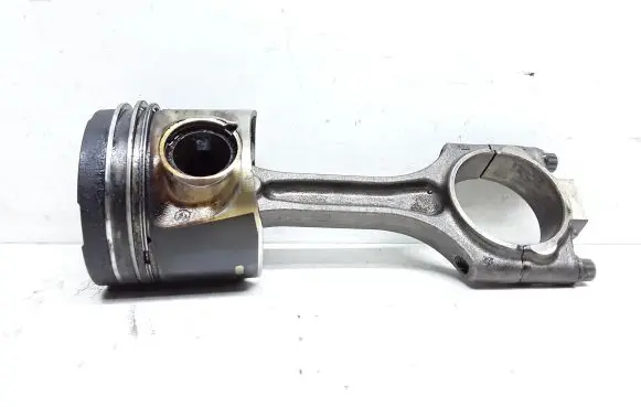 Piston with connecting rod
