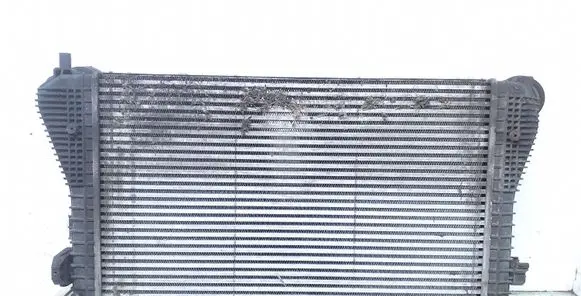 Volkswagen Touran I Intercooler radiator 1K0145803L