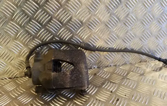 Volkswagen Golf V Front brake caliper