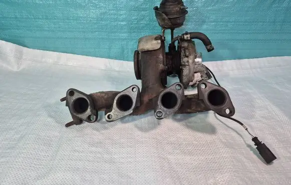 Volkswagen PASSAT B6 Turbo 03G253014K 704213AK100
