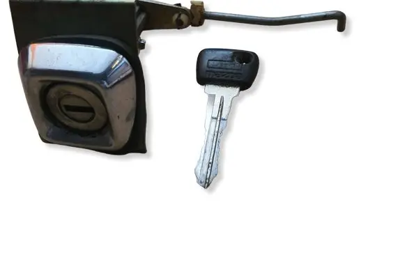 Mazda 323 Tailgate release/open handle 