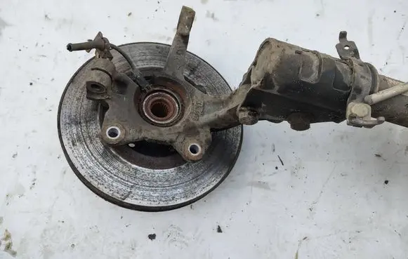 Front wheel hub spindle knuckle