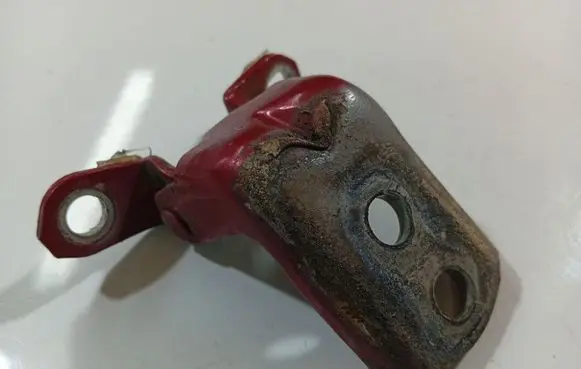 Nissan Micra Front door upper hinge