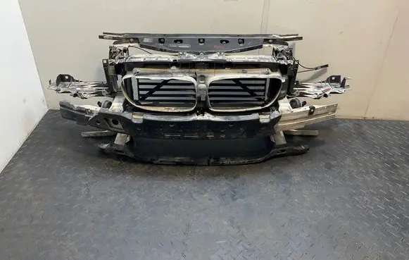 Radiator support slam panel