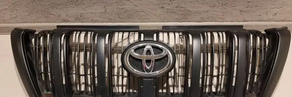 Toyota Land Cruiser (J150) Front bumper upper radiator grill 5311160460