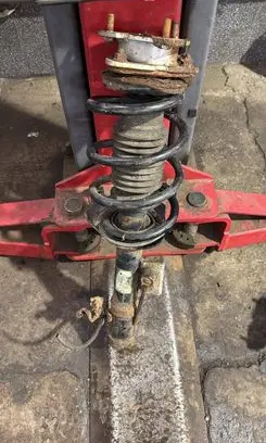 Jeep Patriot Front shock absorber with coil spring P68058844AB