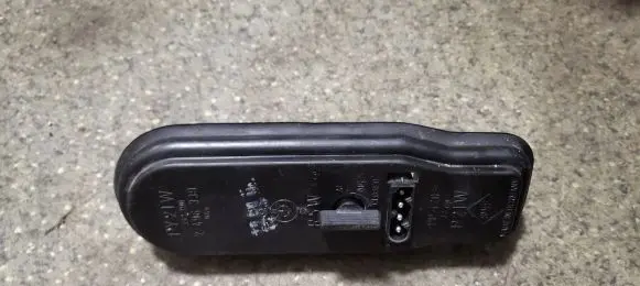 Tail light bulb cover holder