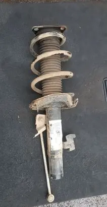 Front shock absorber with coil spring