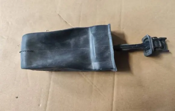 Front door check strap stopper
