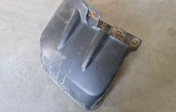 Mitsubishi L200 Rear mudguard MN117453