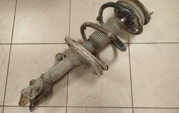 Hyundai H-1, Starex, Satellite Front shock absorber with coil spring