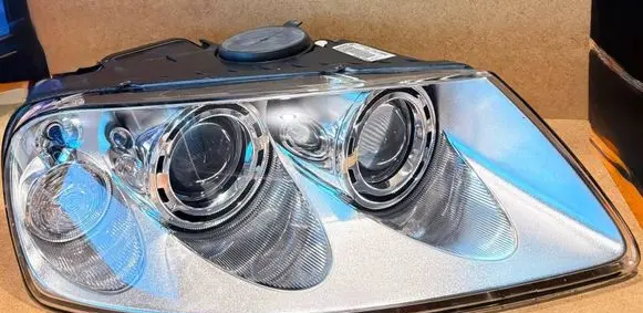 Volkswagen Touareg I Headlight/headlamp 89307869 088398