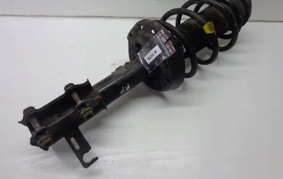 Chevrolet Cruze Front shock absorber with coil spring 13265244