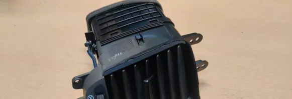 KIA Sorento Dash center air vent grill 974303E500