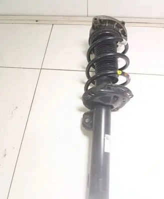 Skoda Enyaq iV Front shock absorber with coil spring 1EA413031AA 1EA413031
