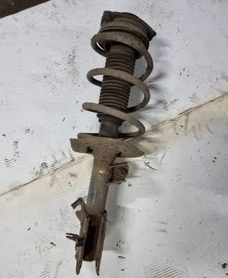 Nissan X-Trail T31 Front shock absorber with coil spring NOCODE