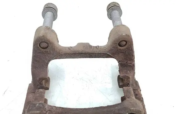 Volkswagen PASSAT B6 Brake caliper pad carrier rear 