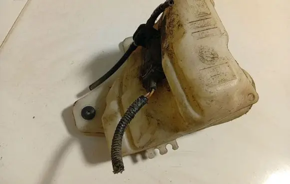 Fiat Grande Punto Windshield washer fluid reservoir/tank 55702892