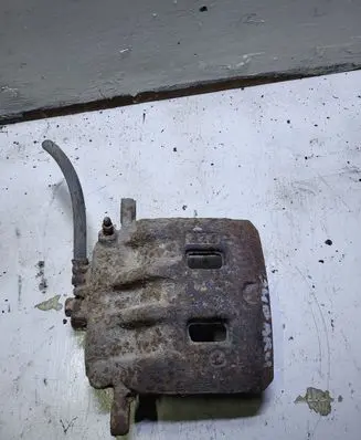 Subaru Forester SF Front brake caliper