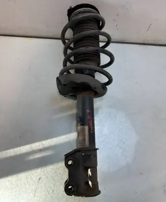 Front shock absorber with coil spring