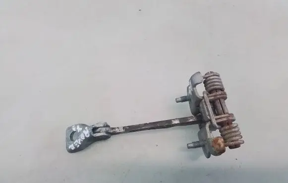 Front door check strap stopper