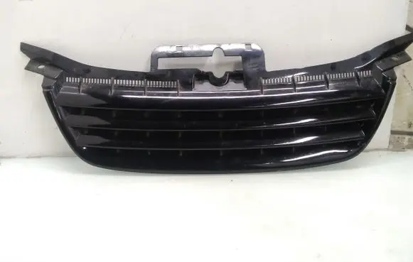 Volkswagen Touran I Front bumper upper radiator grill