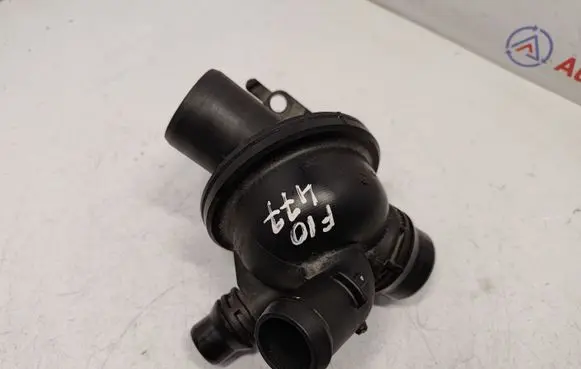 Thermostat/thermostat housing
