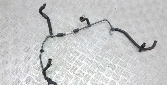 Volkswagen Golf VIII Engine coolant pipe/hose 06K121034
