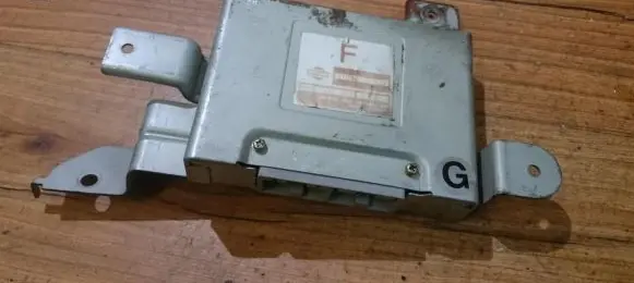 Nissan Almera N16 Gearbox control unit/module 64000A63 310365M40D