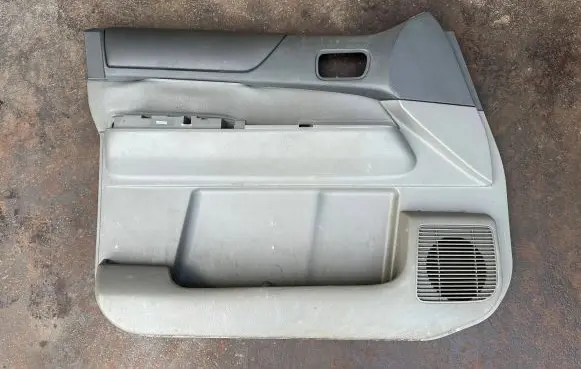 Nissan Patrol Y61 Front door card panel trim 80977VB010 80901VB000