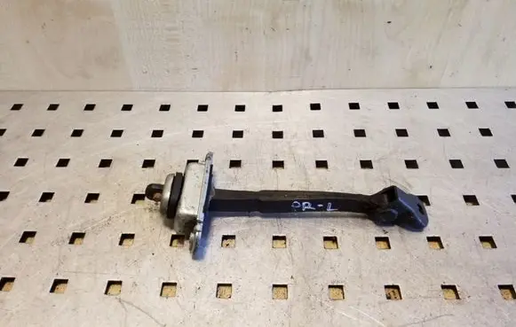 Front door check strap stopper
