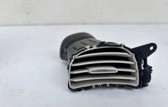 Fiat 500E Dash center air vent grill 735627509