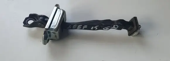 Nissan Leaf I (ZE0) Rear door check strap stopper