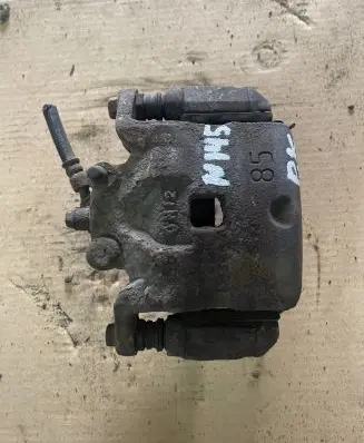Nissan Juke I F15 Front brake caliper
