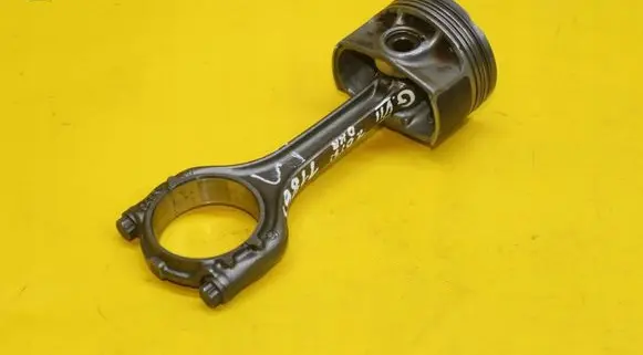 Piston with connecting rod