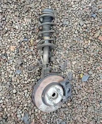Front shock absorber with coil spring