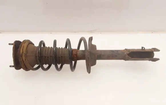 Toyota Yaris Front shock absorber with coil spring