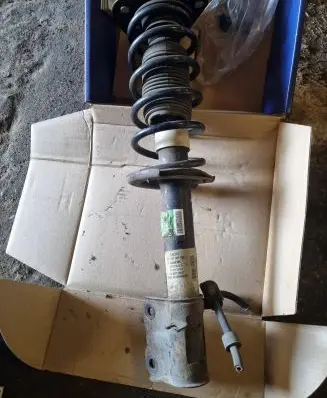 Mitsubishi Colt Front shock absorber with coil spring 4060A105 801402000089