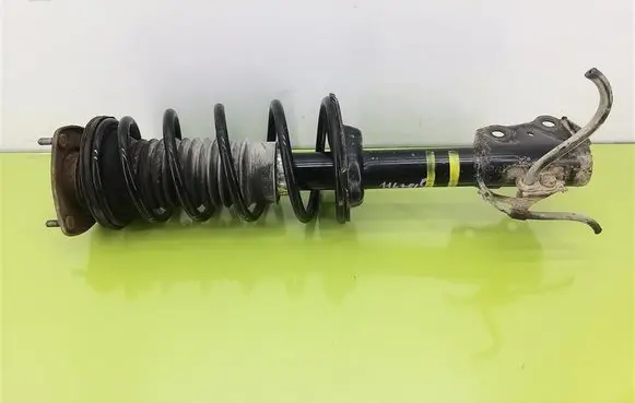 Toyota Yaris Front shock absorber with coil spring