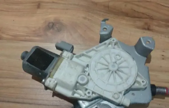 Front door window regulator motor
