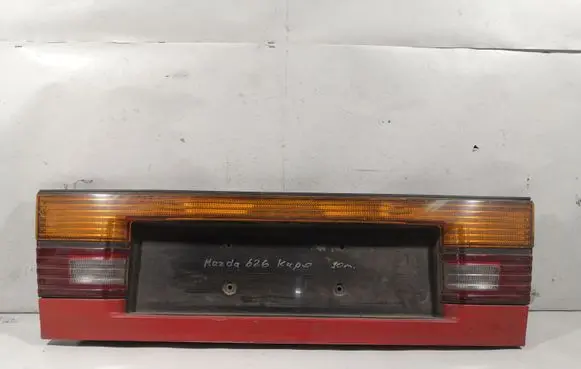Mazda 626 Rear light center trim bar blend 0437835