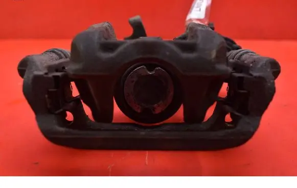 Opel Astra J Rear brake caliper 