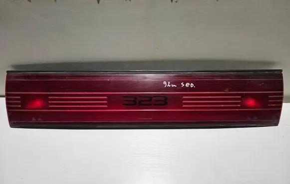 Mazda 323 Rear light center trim bar blend 23661602