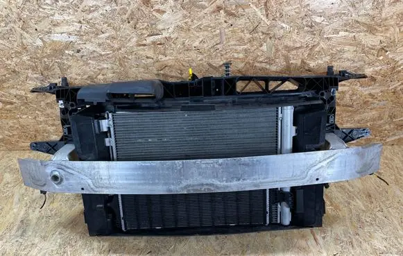 Radiator support slam panel