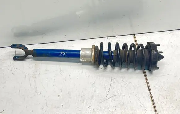 Front shock absorber with coil spring