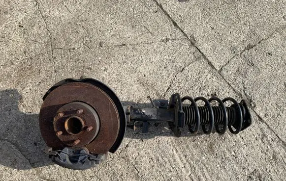 Ford Focus Front shock absorber with coil spring BV6118045LBB