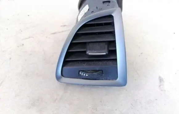 Opel Astra J Dash center air vent grill 522040591 13417595