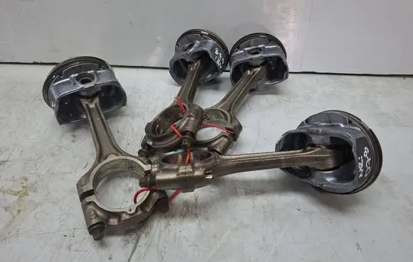 Opel Astra J Piston with connecting rod S27612078 A16XER Z16XER